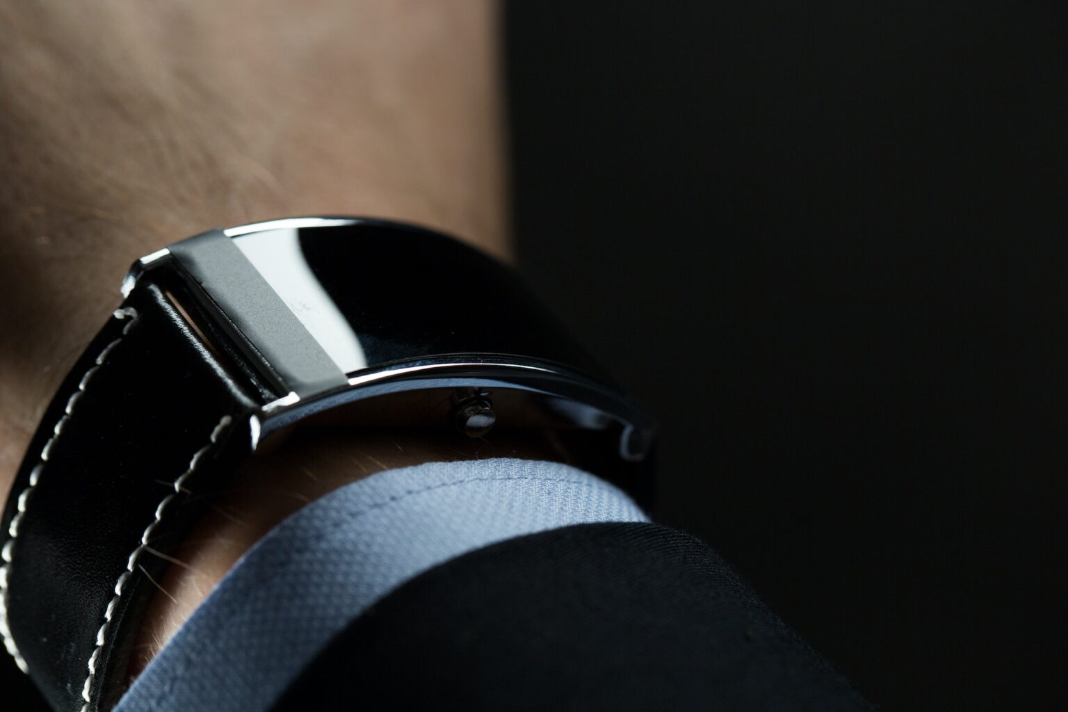 close up of businessman hand with smart watch